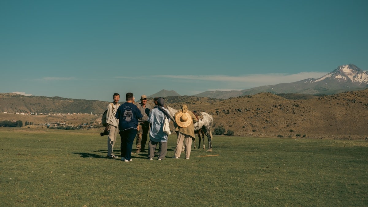 A group of friends in the grassland